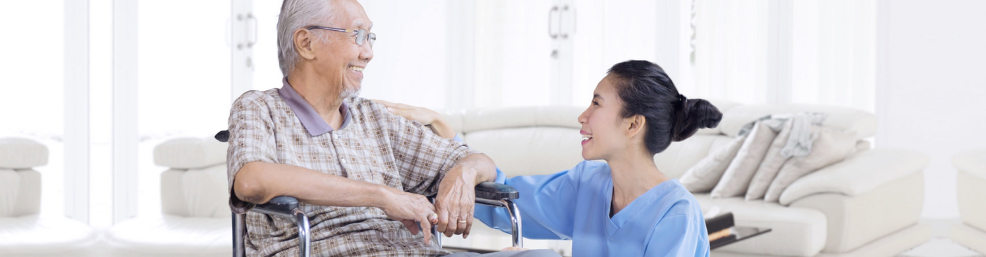 caregiver and old man talking